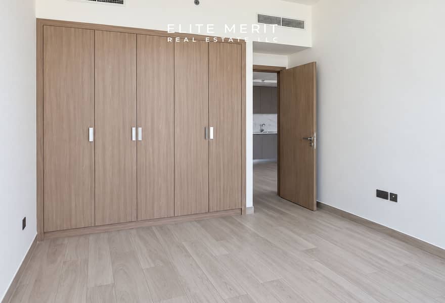 9 Bright Minimalist Bedroom with Open Door. jpg