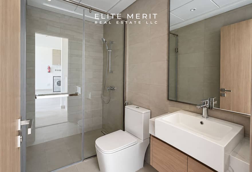10 Modern Minimalist Bathroom with Glass Shower. jpg