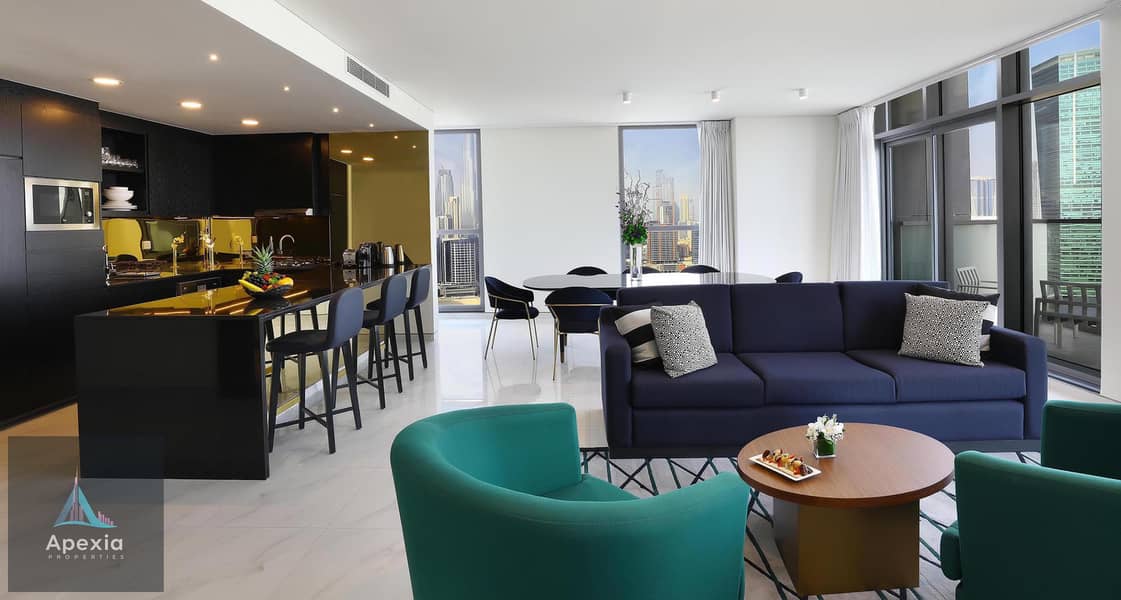 3 MABB 3 Bedroom Apt Living Room Kitchen. jpg