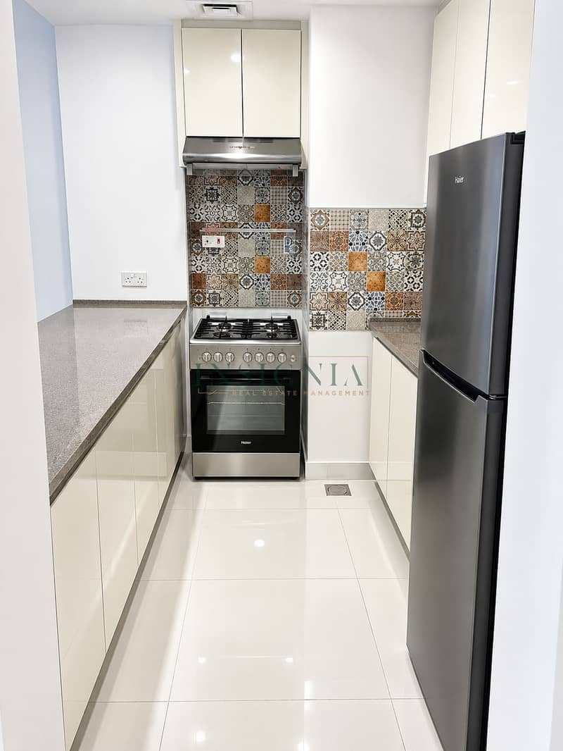 5 Modern Galley Kitchen with Patterned Backsplash. png