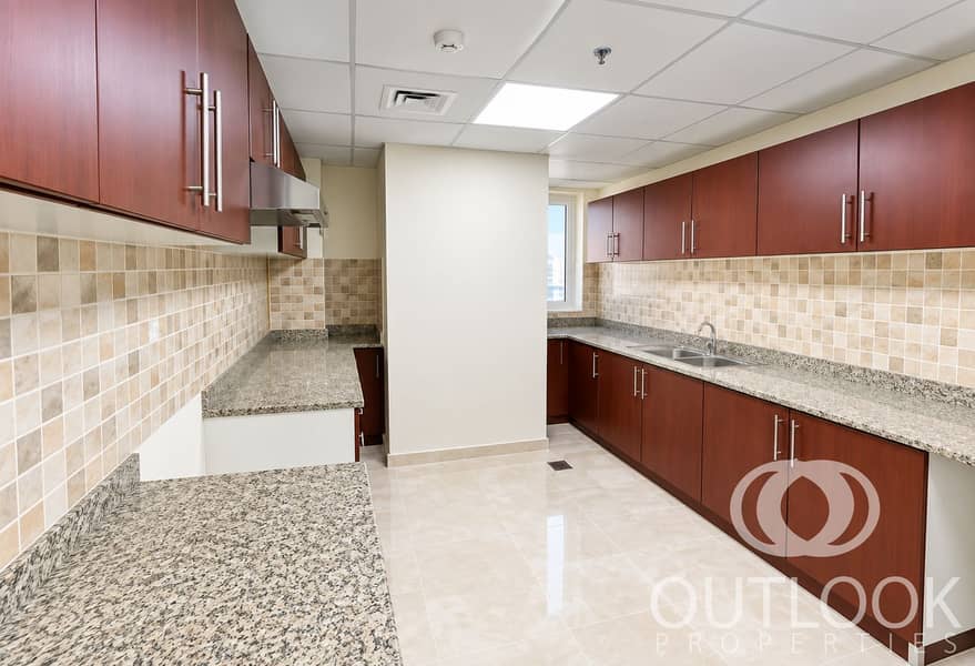 8 Bright Modern Galley Kitchen Interior. png