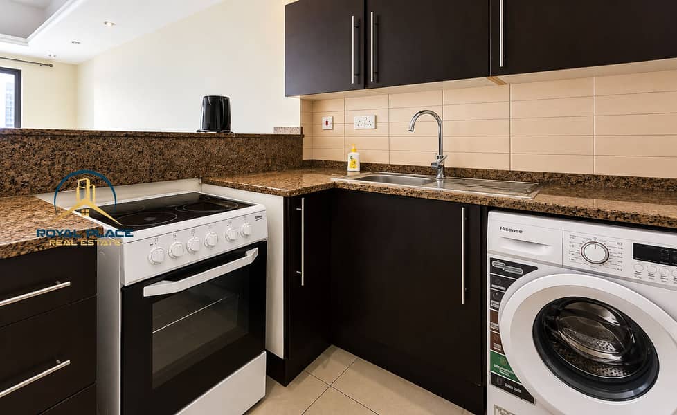 7 Modern Espresso Kitchen with Integrated Appliances. png