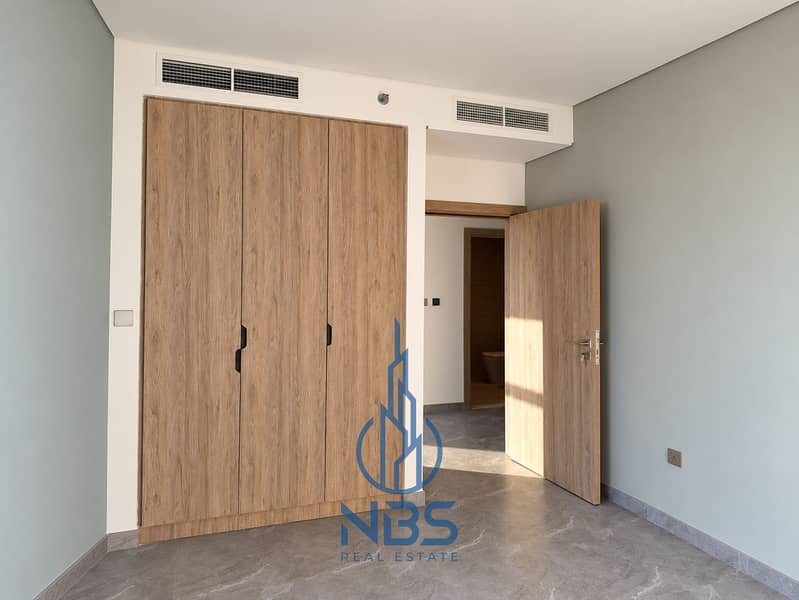 7 Sunlit room with wardrobes and open doors-4. png