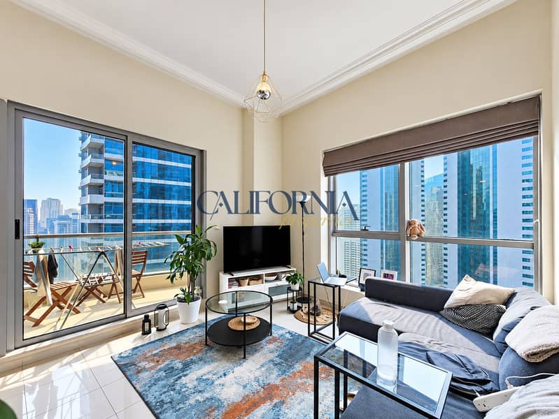 2 Refined living room with balcony view. png