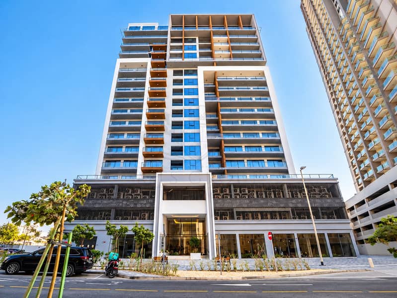 3 Modern High-Rise Facade in Sunlight. png