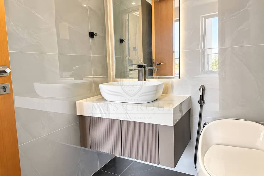 9 Modern Marble Bathroom with Ribbed Vanity. png