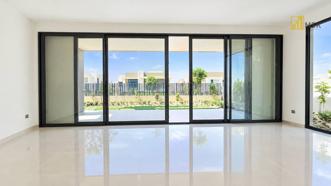 4 Minimalist Living Room with Garden Views. png