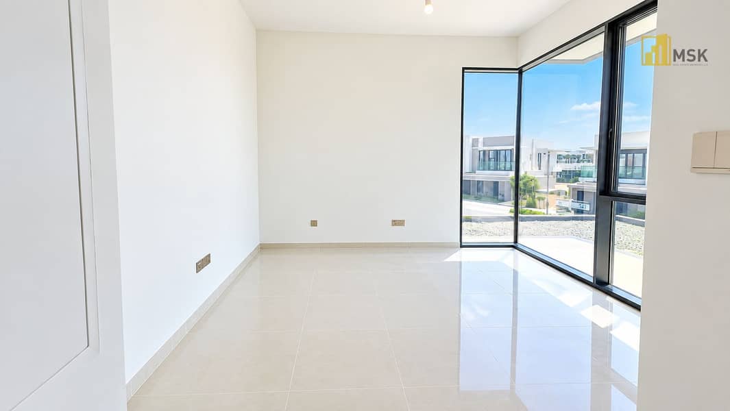 11 Bright Minimalist Room with Corner Windows. png