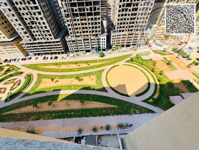 2 Bedroom Flat for Rent in Emirates City, Ajman - Aerial View of Urban Courtyard Construction. png 2 Bedroom Flat for Rent in Emirates City, Ajman - Aerial View of Urban Courtyard Construction. png