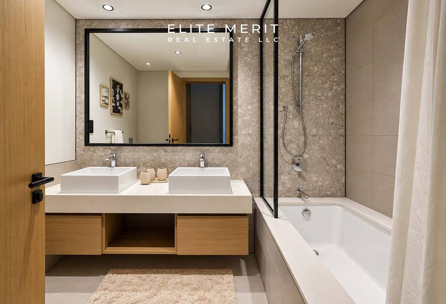 11 Modern Spa Bathroom with Warm Wood Accents. jpg