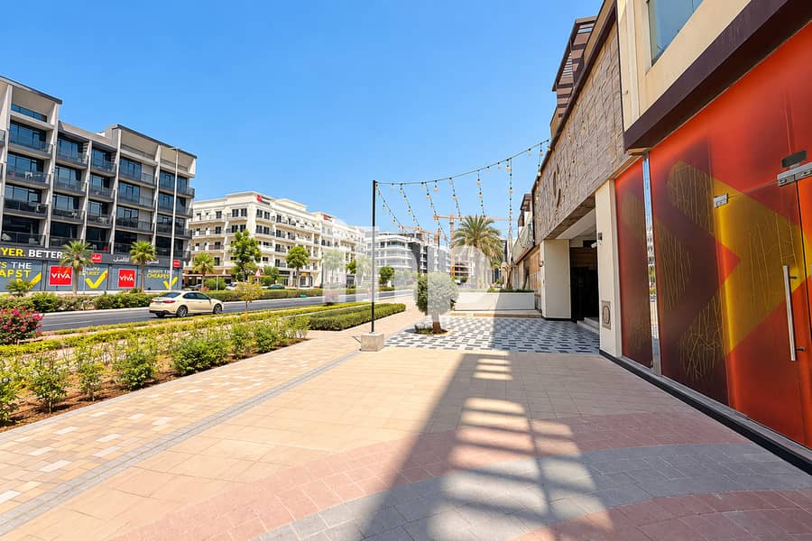 13 wide_bright_daytime_urban_street_scene_in_a_moder. jpg