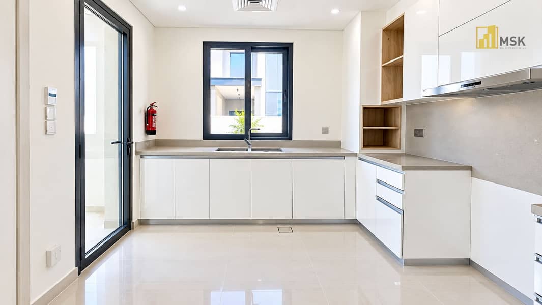 5 Bright Minimalist Kitchen with Red Accent. png