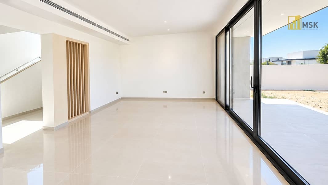 8 Minimalist Sunlit Living Room. png