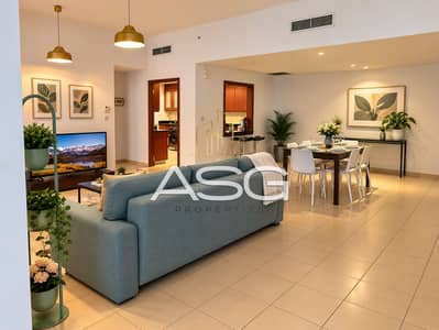 4 Bedroom Apartment for Rent in Jumeirah Beach Residence (JBR), Dubai - Modern Teal Living and Dining Room. png