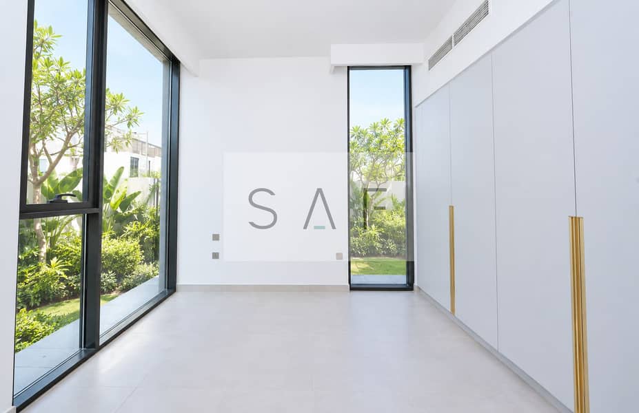 5 White Room with Lush Garden Views. png