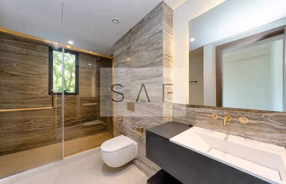 8 Lush garden view through shower window. png