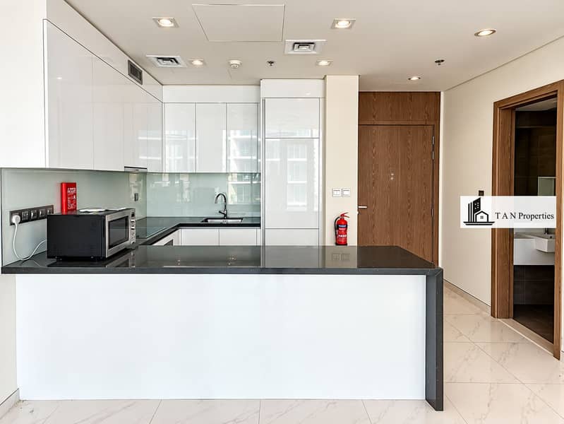 5 Modern Minimalist Kitchen with Fire Safety Accents. png