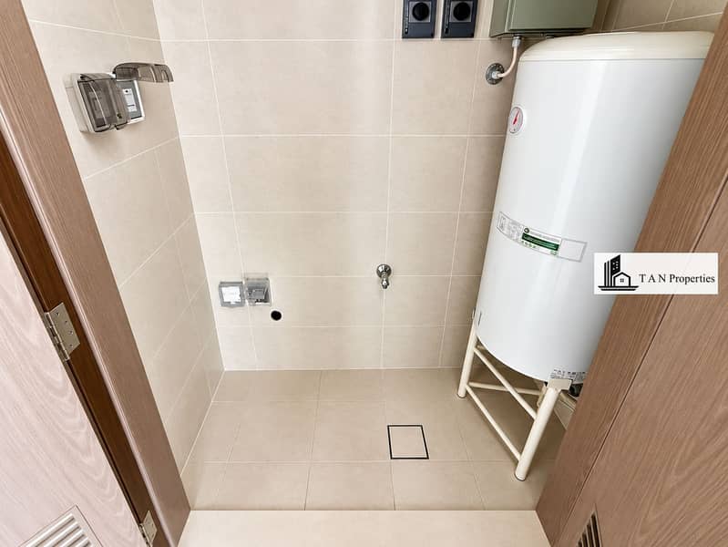 9 Modern Tiled Utility Closet. png