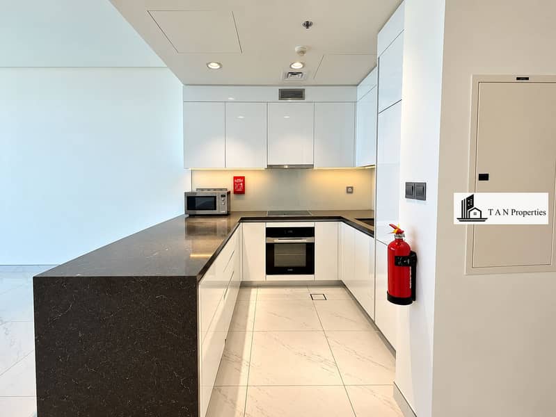 6 Modern U-Shaped Kitchen with Safety Accents. png