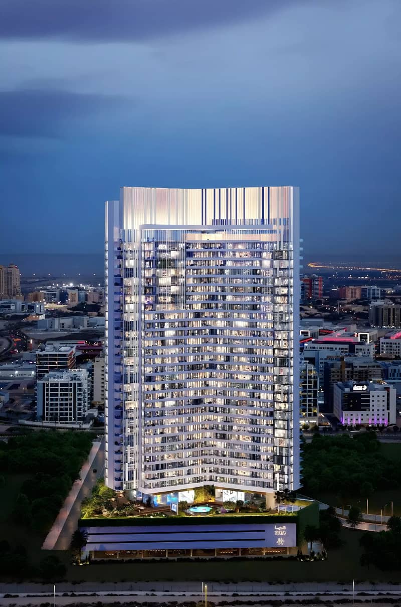 11 Aerial render of a tall, illuminated residential tower at dusk with lit windows and a podium-level pool deck.