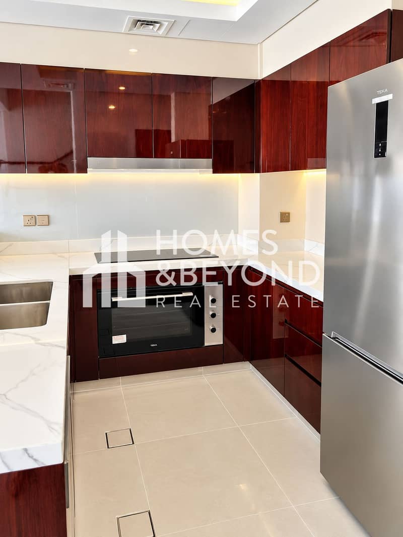 8 Modern Glossy Wood Kitchen Interior. png
