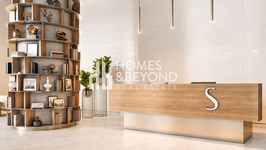 1 Slaapkamer Appartement te Koop in Motor City, Dubai - Clean cream-panelled reception desk. png