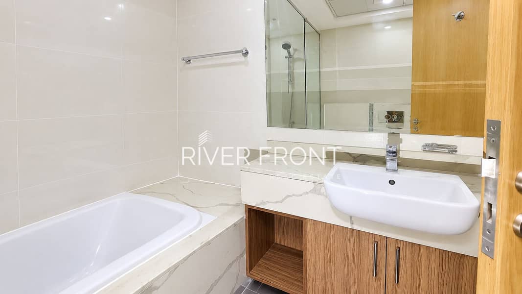 7 Modern Marble-Tiled Bathroom Interior. jpg