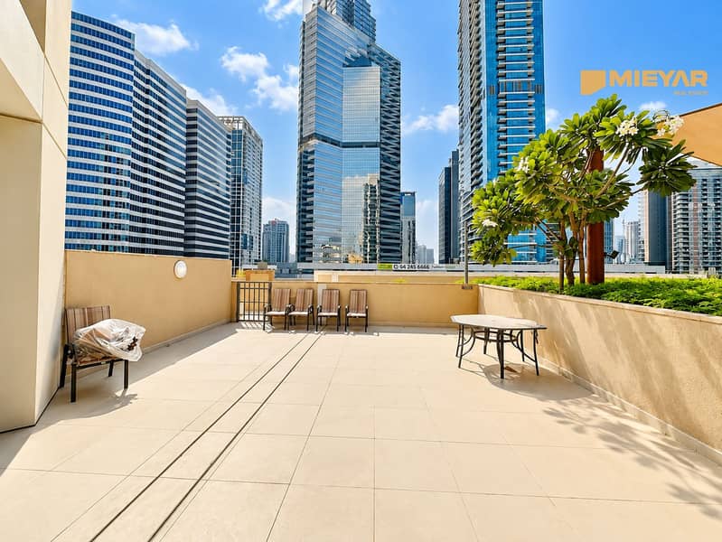 11 Modern Rooftop Terrace Overlooking the City. png