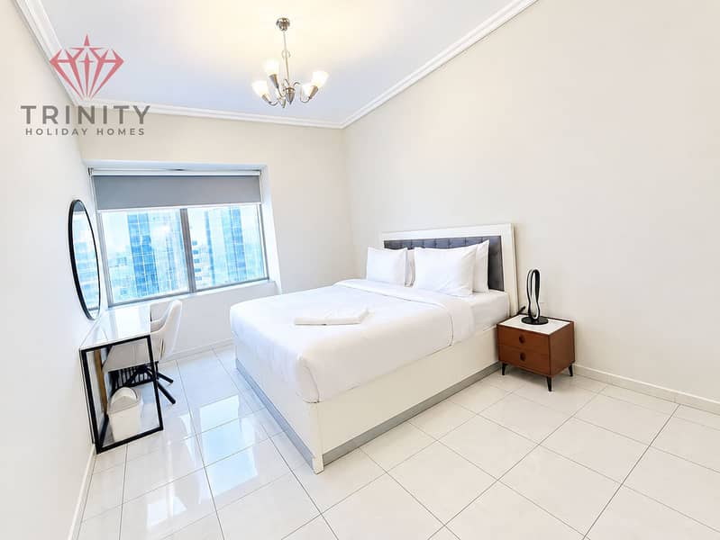 11 Bright Minimalist Bedroom with City View. png
