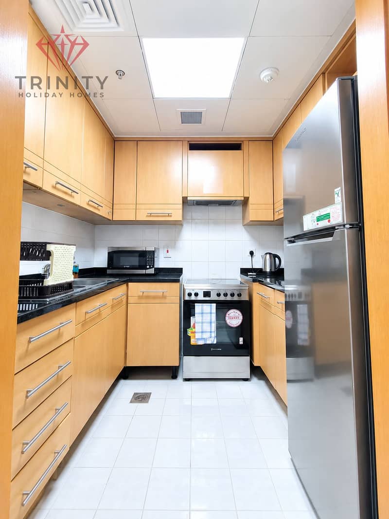 4 Bright Modern Galley Kitchen Interior. png