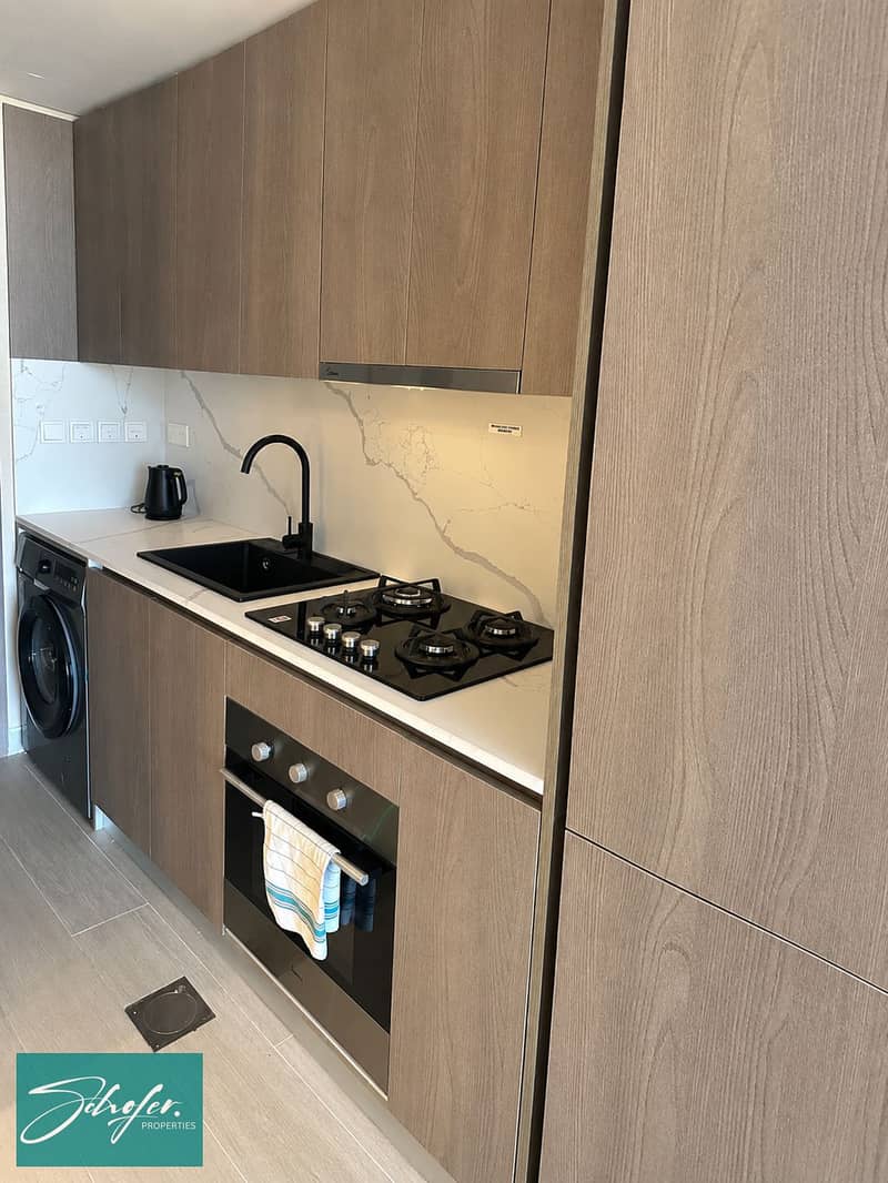 6 Minimalist Kitchen with Black Kettle. png