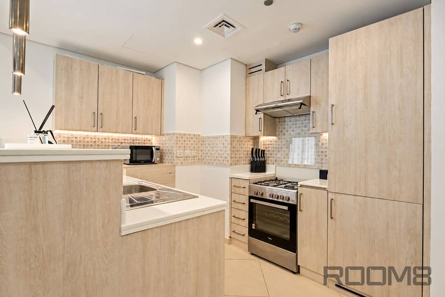 9 Warm Modern Kitchen with Oak Cabinetry. png