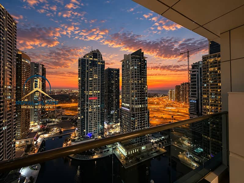 2 Dubai Skyline at Dusk from a Balcony. png