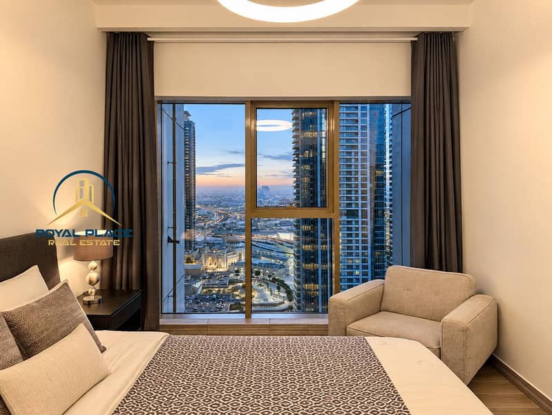 9 Cozy Bedroom Overlooking the City at Dusk. png