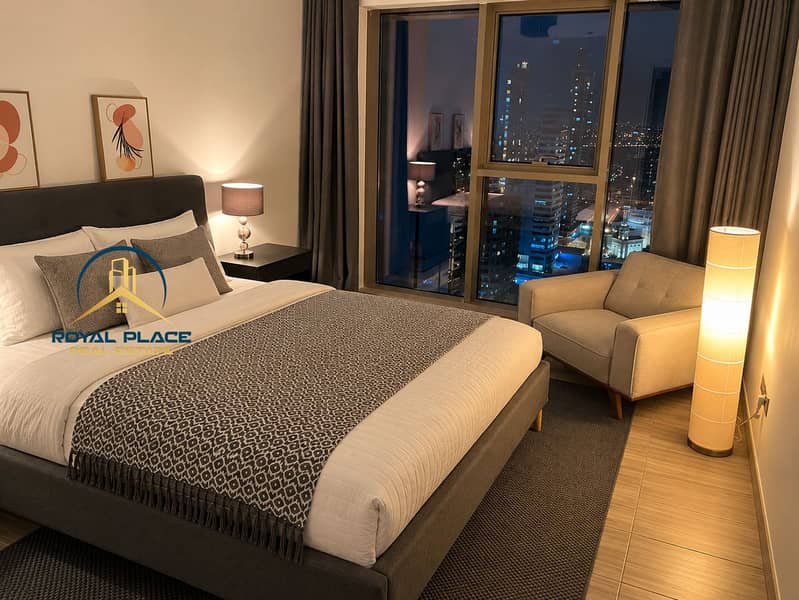 10 Warm Modern Bedroom Overlooking City Lights. png