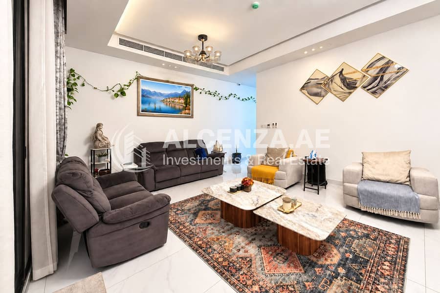2 Modern Living Room with Scenic Landscape Art. png