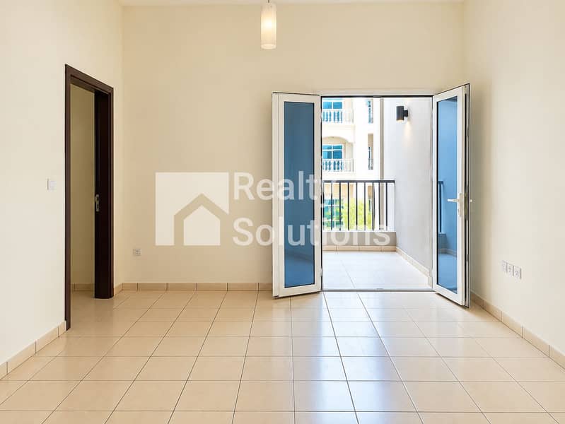 11 Sunlit Minimalist Living Room with Balcony. png