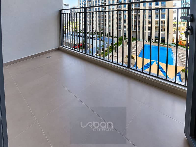 9 Modern Balcony Overlooking Pool Courtyard (1). png