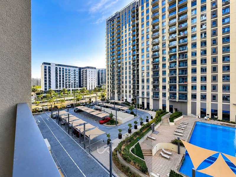 11 Modern Apartment Complex with Pool and Parking. png