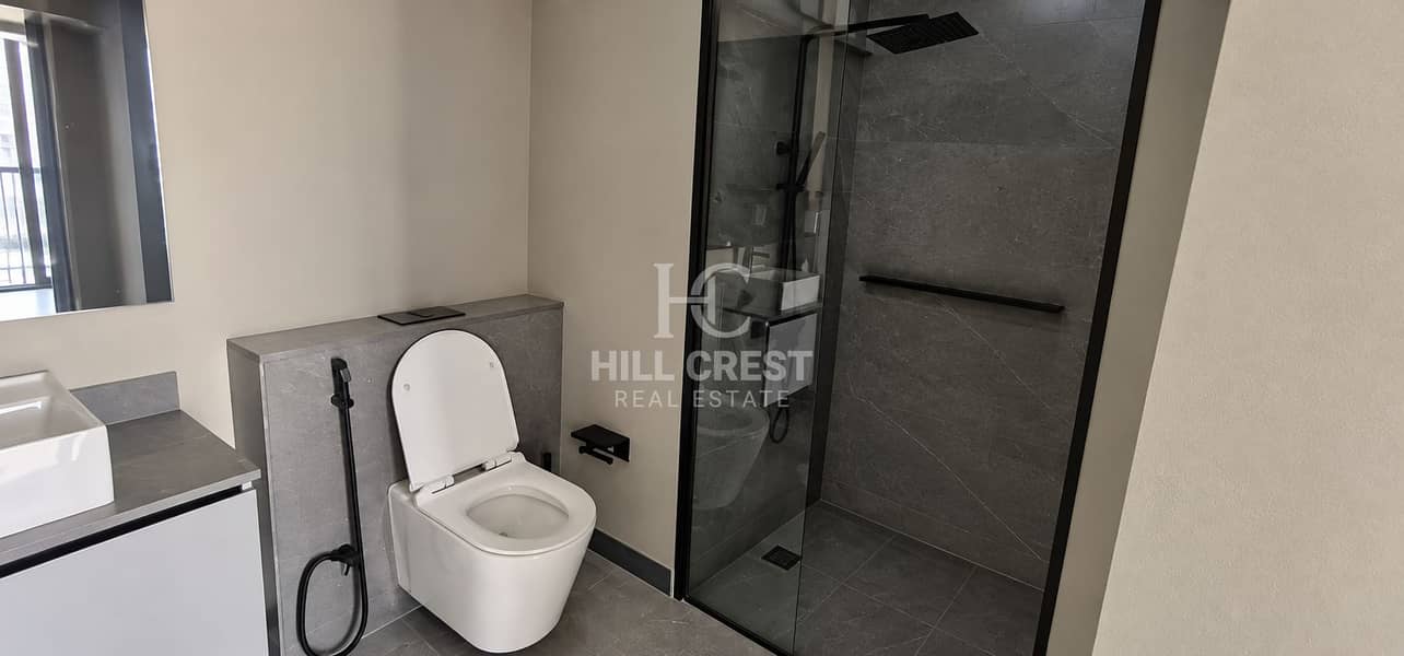 10 Modern Minimalist Bathroom with Walk-In Shower. png