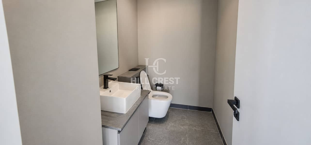 11 Modern Minimalist Half-Bathroom. png