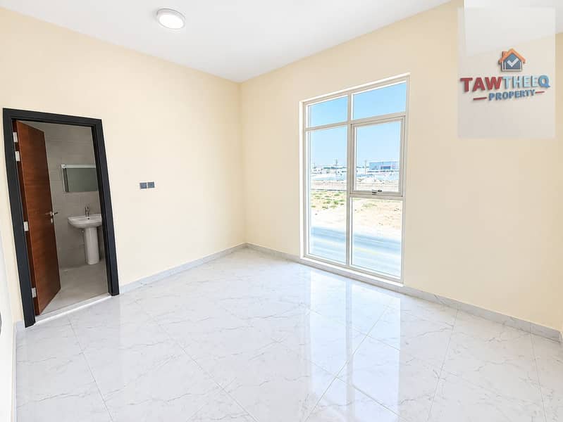2 Bright Minimalist Room with Bathroom View. png