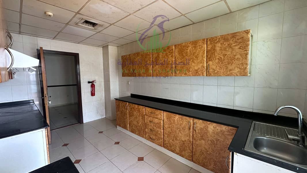 17 apartment-for-rent-2-bedroom-almjaz2-alsharqh-kitchen-07. jpg