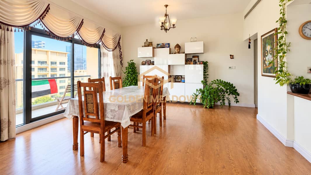 3 Bright Contemporary Dining Room with Balcony Views. png