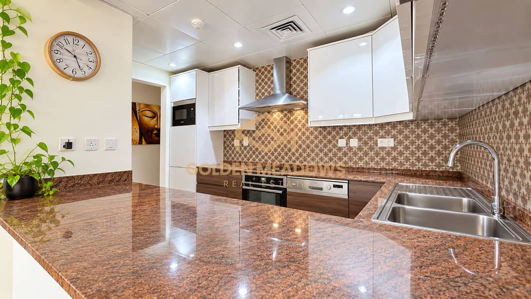7 Modern Kitchen with Granite Countertops. png