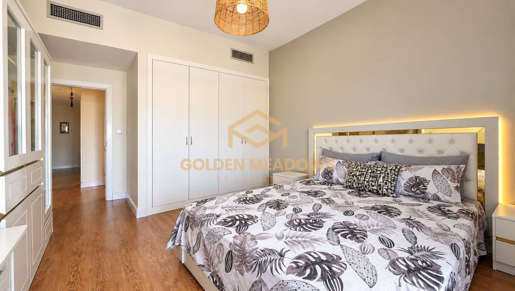 16 Neatly Staged Tropical Bedroom. png