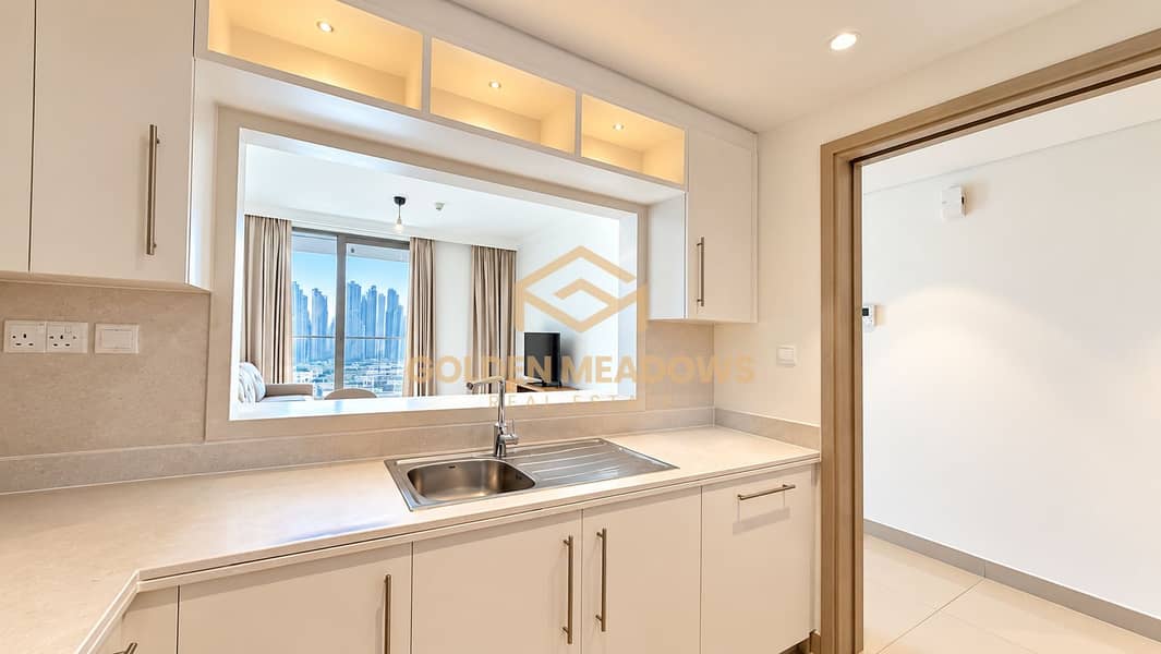 5 Modern Kitchen with Skyline View. png
