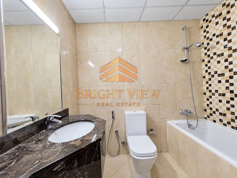 25 Bright, polished vacant apartment bathroom-4. png