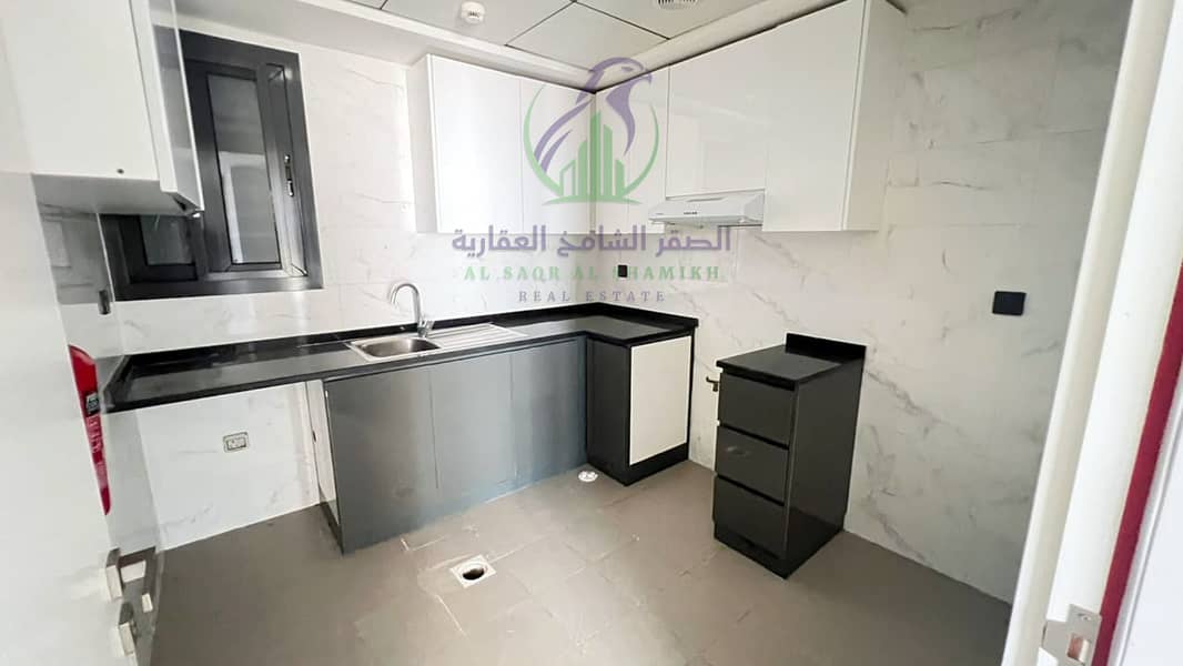 13 apartment-for-rent-2-bedroom-altaawn-alsharqh-kitchen-09. jpg