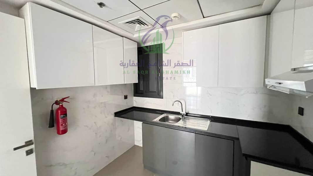 14 apartment-for-rent-2-bedroom-altaawn-alsharqh-kitchen-06. jpg